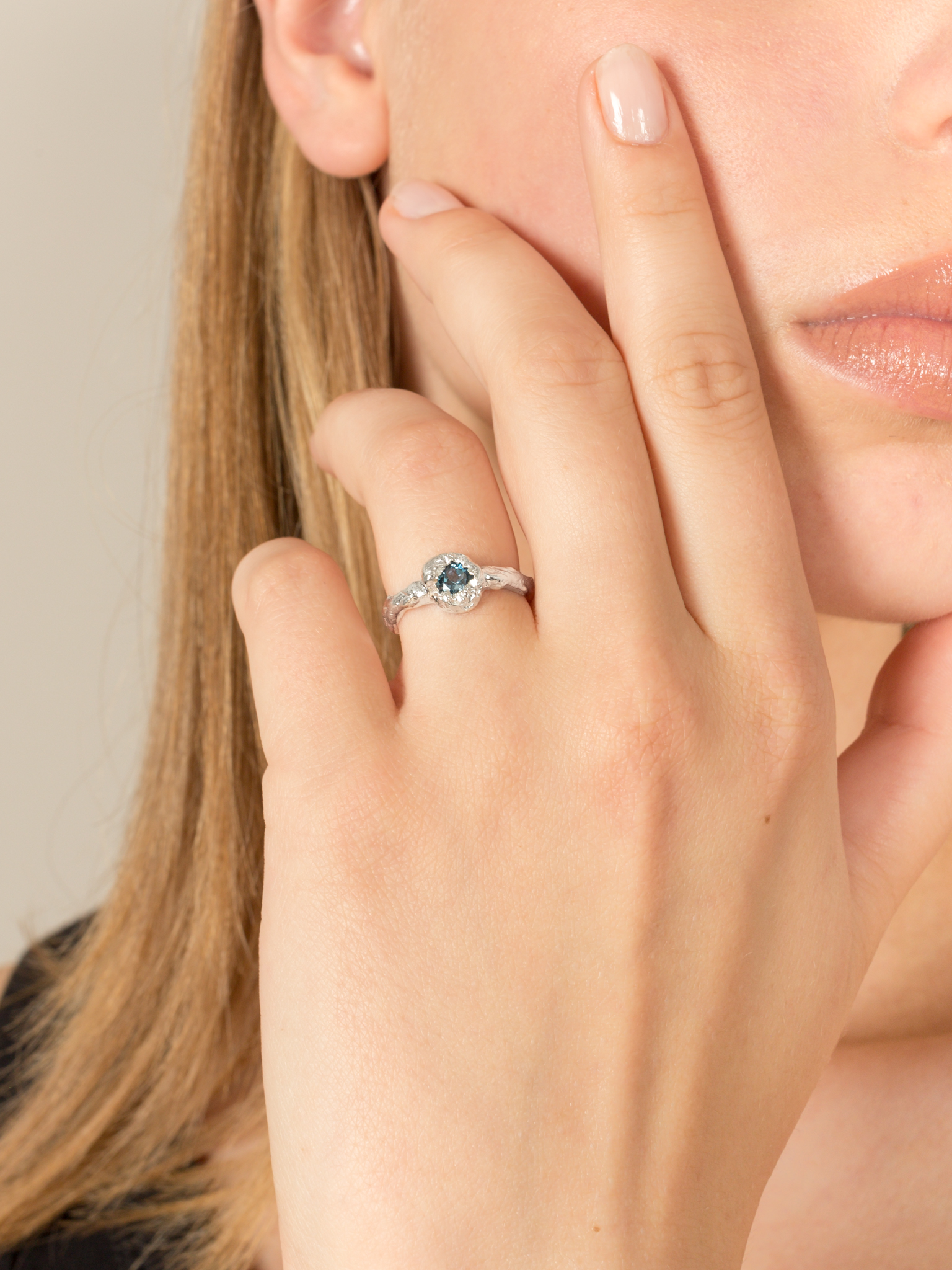 Molten mess round blue topaz ring