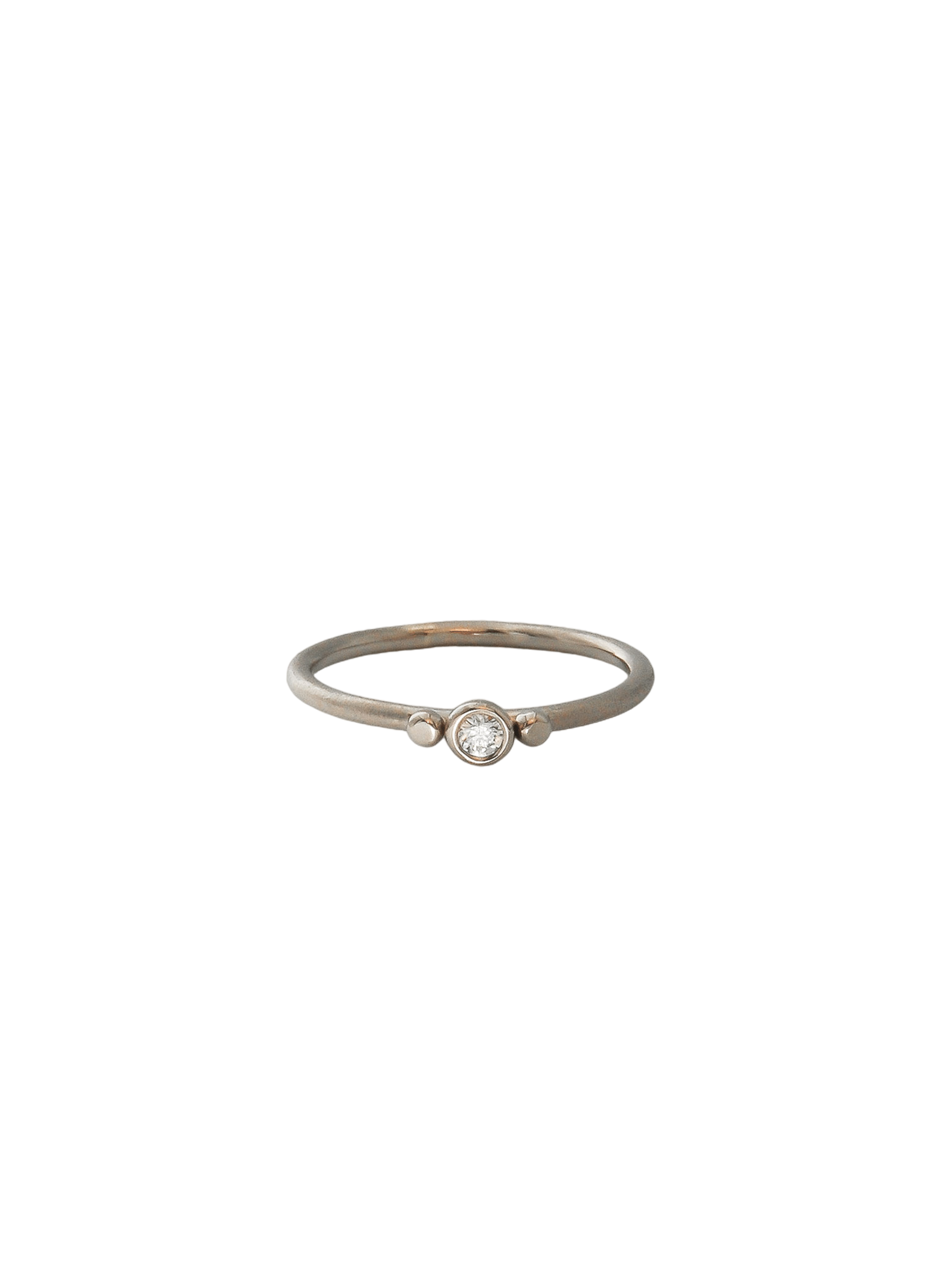 White gold three dots ring with diamond
