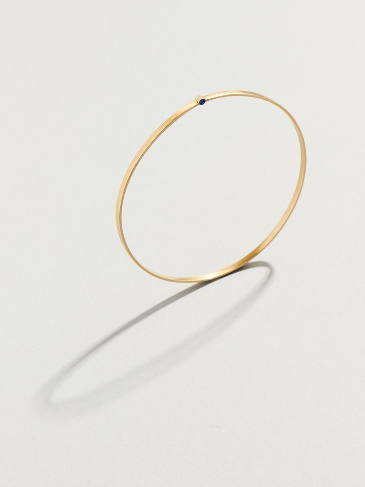 Cassini bangle in blue sapphire