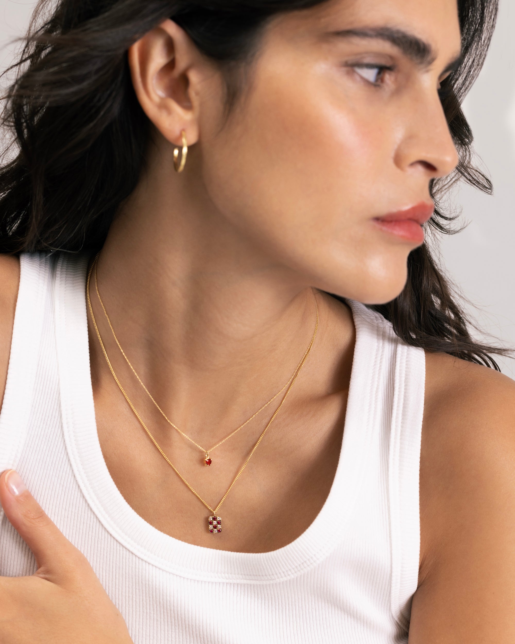 Necklace with ruby and diamond chessboard pendant in 18 ct. gold