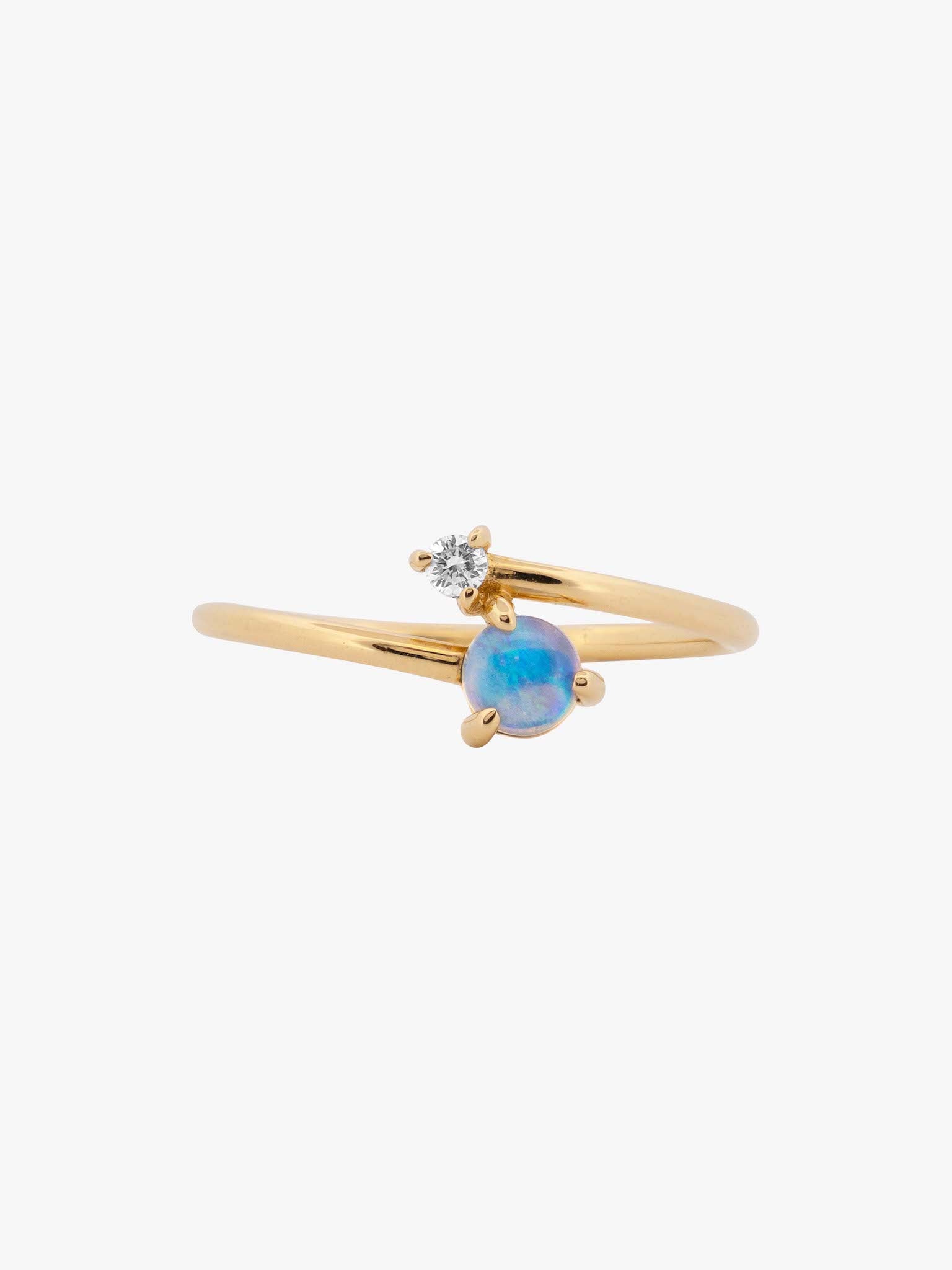 Opal and diamond crossover ring