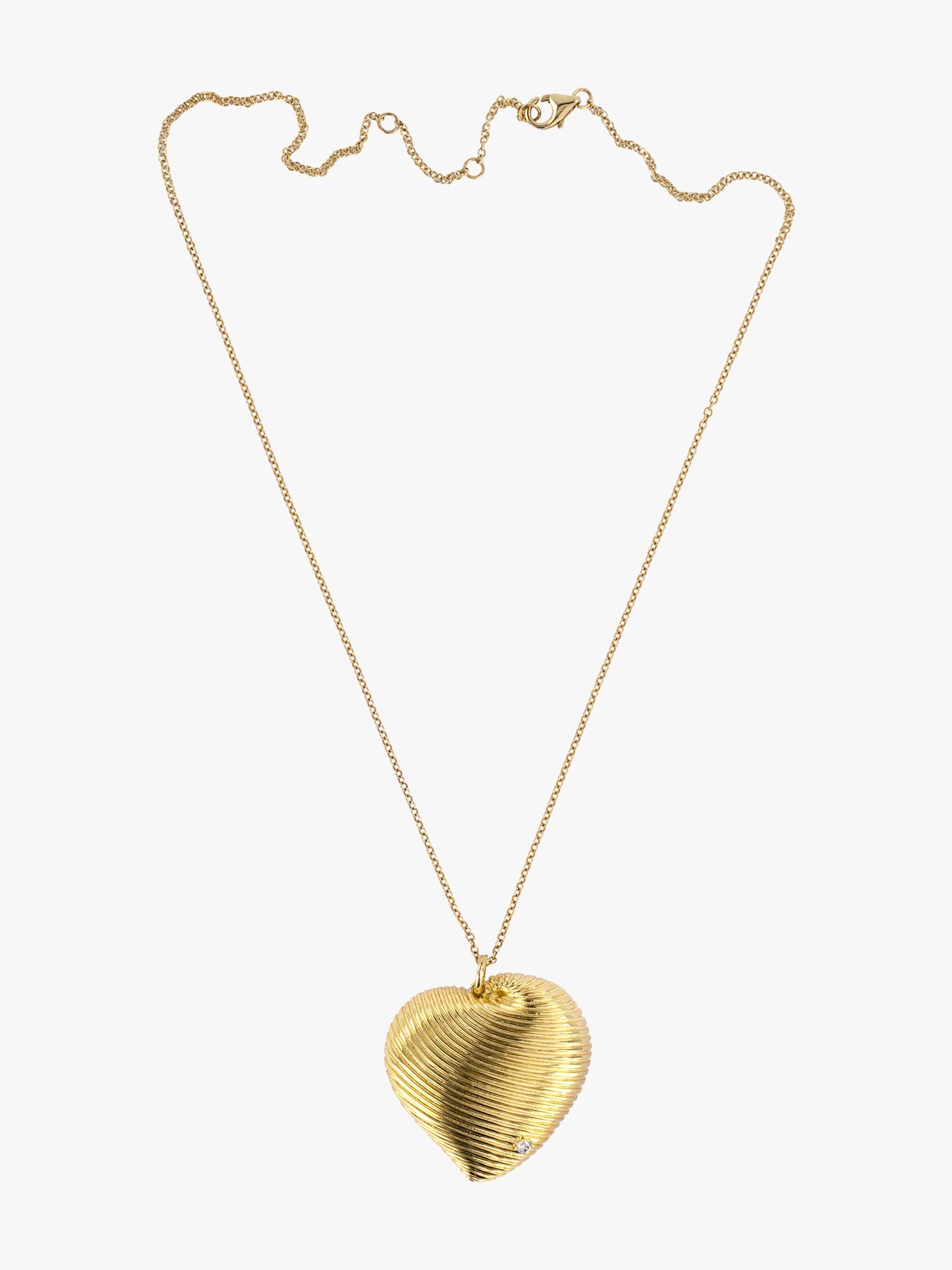 Diamond and gold heart pendant necklace