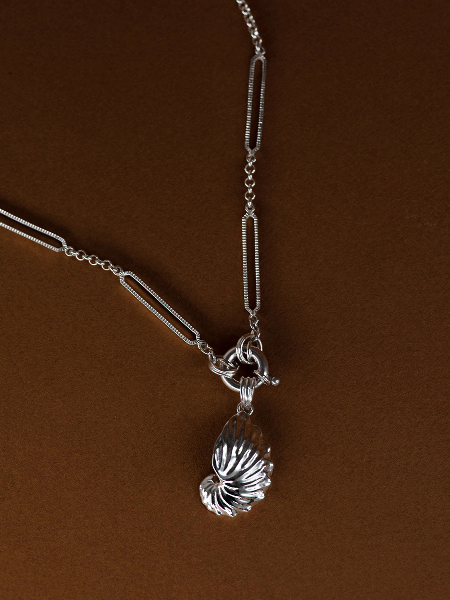 Paper nautilus charm silver